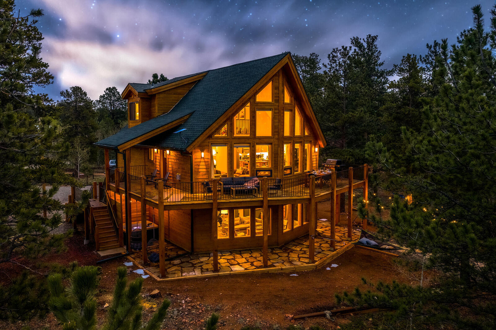 A-frame cabin under stars